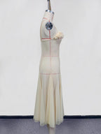 Floral embellished spaghetti strap dress by Shopimist featuring delicate floral details and a stylish silhouette.