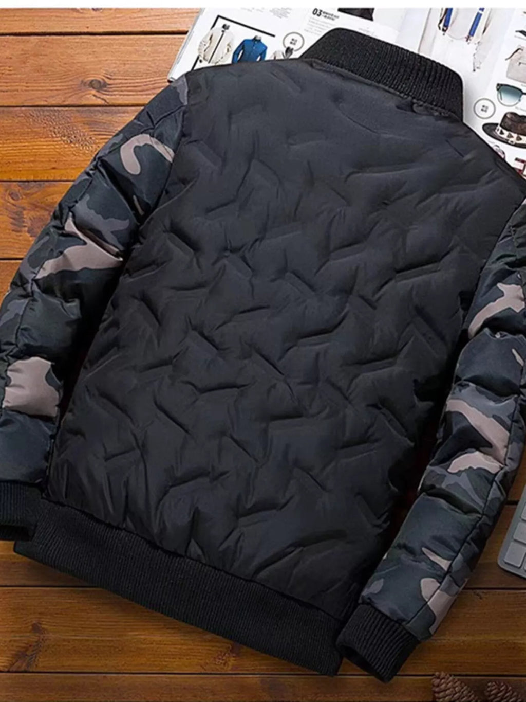 Men's full size camouflage padded bomber jacket by Shopimist, featuring a durable design and comfortable fit in a rugged camouflage pattern.