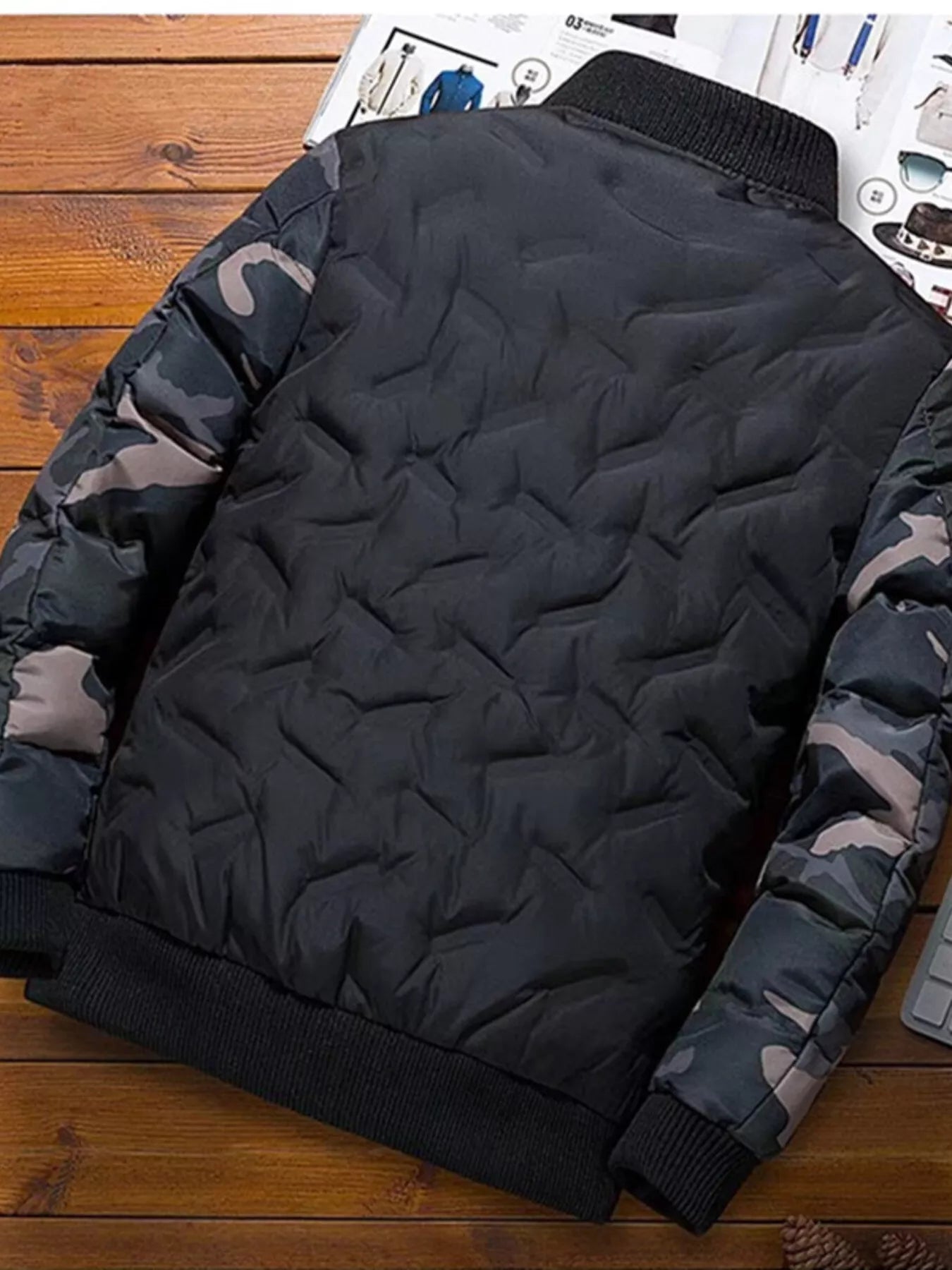Men's full size camouflage padded bomber jacket by Shopimist, featuring a durable design and comfortable fit in a rugged camouflage pattern.