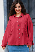 VYSN distressed button-up raw hem denim jacket shown on a model, featuring a casual fit and rugged style.