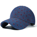 Women's heart print casual baseball hat by Trendsi, adjustable sport cap with a cute heart pattern and relaxed fit.