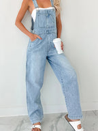 Women's relaxed fit wide strap denim overalls, casual comfortable jumpsuit with front pockets and adjustable straps from Trendsi.
