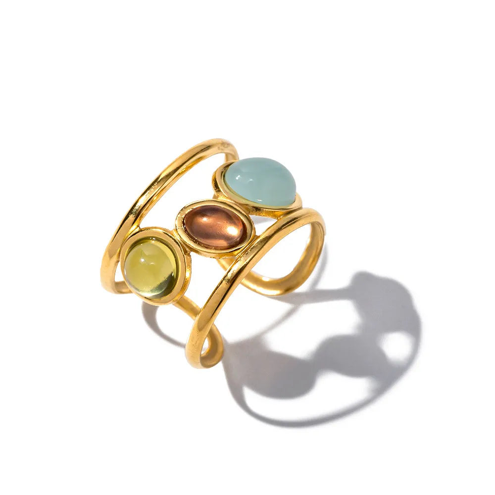 18K gold-plated gemstone open cuff ring with intricate design, showcasing vibrant gemstones and elegant craftsmanship.