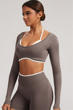 Fitglutes Activewear long sleeve crop top and leggings 2-piece set, stylish gymwear for workout and active lifestyles.