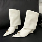 Elegant white faux-leather peep-toe wedge boots with a relaxed, slouchy high-calf shaft and a pointed toe.