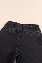 High-waisted button-fly wide-leg jeans by Trendsi, showcasing classic denim with a relaxed fit and stylish wide-leg silhouette.