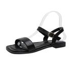 Women's open toe flat sandals by Trendsi, featuring comfortable PU leather slide shoes with chic design and open toe style.