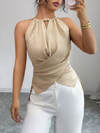 Plush Fashion Hub halter neck crisscross cami tank top in black, featuring a stylish neckline and fitted design.