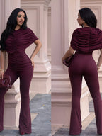 Trendsi ruched flare leg jumpsuit featuring a fitted bodice and wide-leg design, shown in a stylish, casual fit.