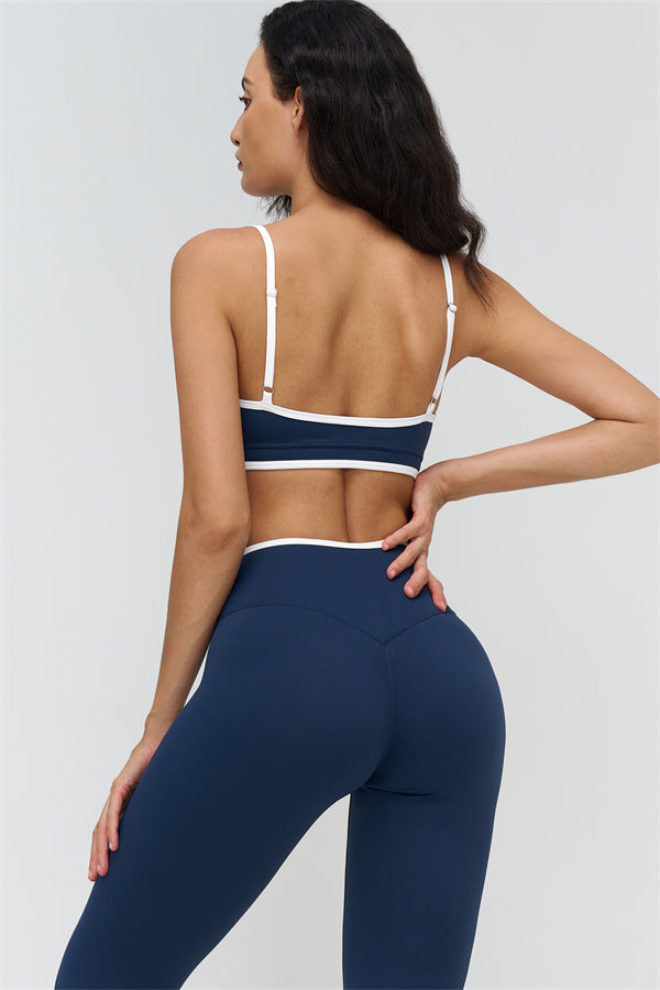 Plush Fashion Hub Crave Contrast Sports Bra and Leggings 2-piece set, black and white athletic activewear for women.