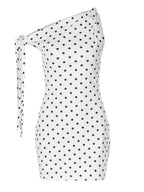 Polka dot sleeveless mini dress with bow accents from Shopimist, featuring a fitted bodice and playful design.