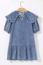 VYSN denim mini dress with ruffled side pockets and puff sleeves, featuring a stylish, casual design perfect for everyday wear.
