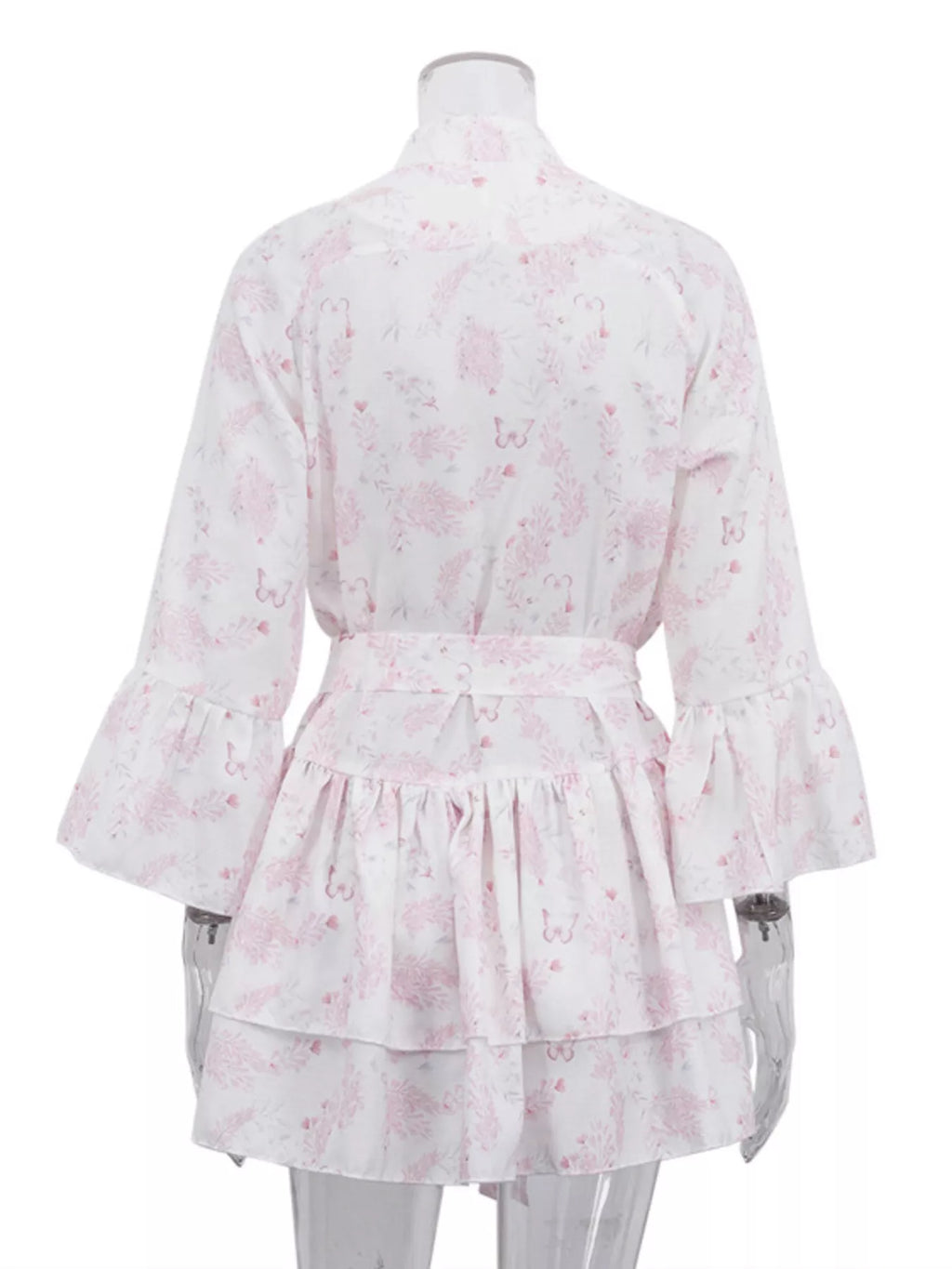 Floral print layered ruffle dress by Shopimist featuring a flowy design and feminine ruffle details in vibrant floral patterns.