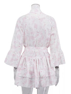 Floral print layered ruffle dress by Shopimist featuring a flowy design and feminine ruffle details in vibrant floral patterns.