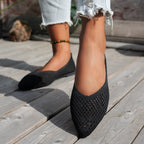 Women's Plush Fashion Hub pointed toe Flyknit slip-on loafers, flat casual footwear with sleek design and comfortable fit.
