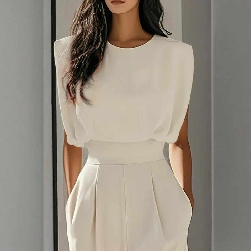 Women’s wide-leg short sleeve jumpsuit by FitiqueFit, casualwear with a relaxed fit, featuring a fitted waist and wide-leg pants.