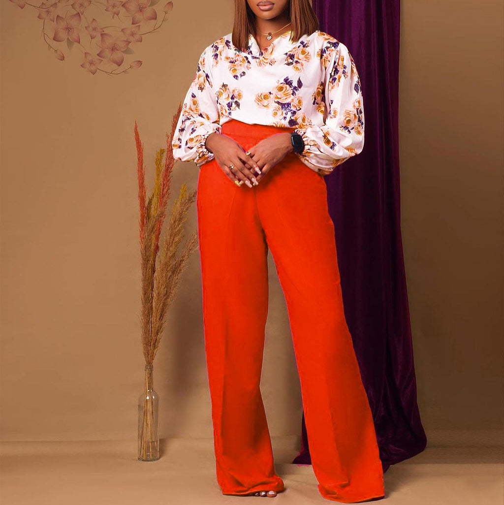Printed floral lace-up top and wide-leg pants set by FitiqueFit, featuring a casual floral design in multiple colors, available in S–3XL.