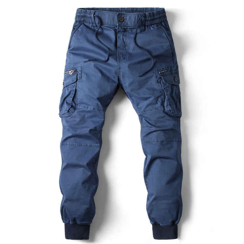 Blue cotton cargo jogger pants with elastic waistband, drawstring, side pockets, and cuffed ankles.