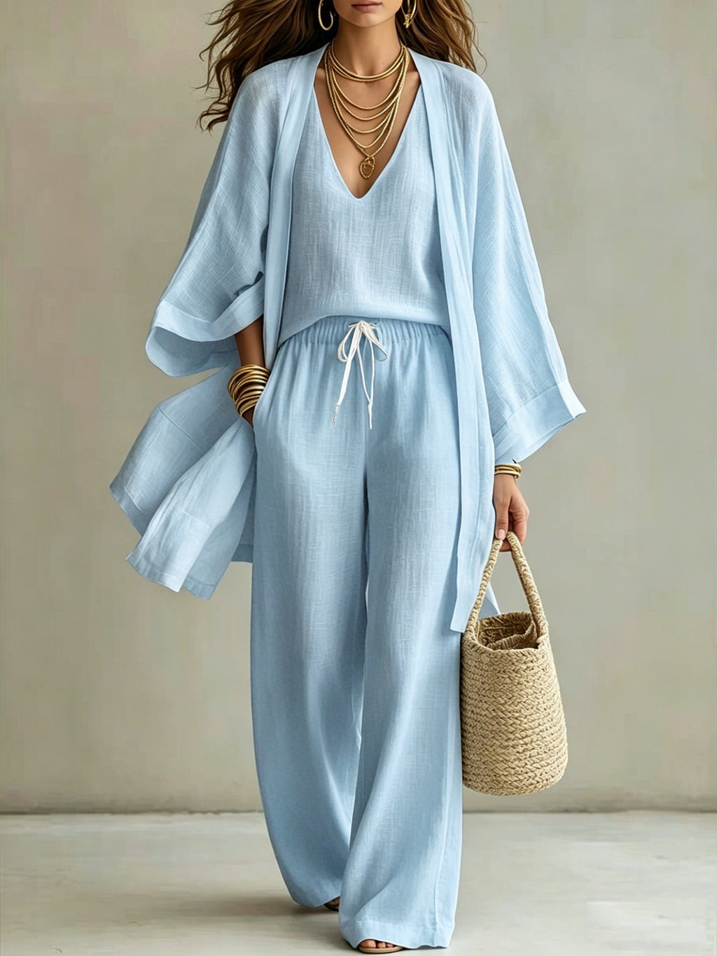 Women's 3-piece cardigan, sleeveless vest, and wide-leg pants matching set by Plush Fashion Hub, shown in neutral tones.