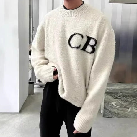 Unisex oversized knit crew neck sweater with CB letter design in a casual style by Plush Fashion Hub.