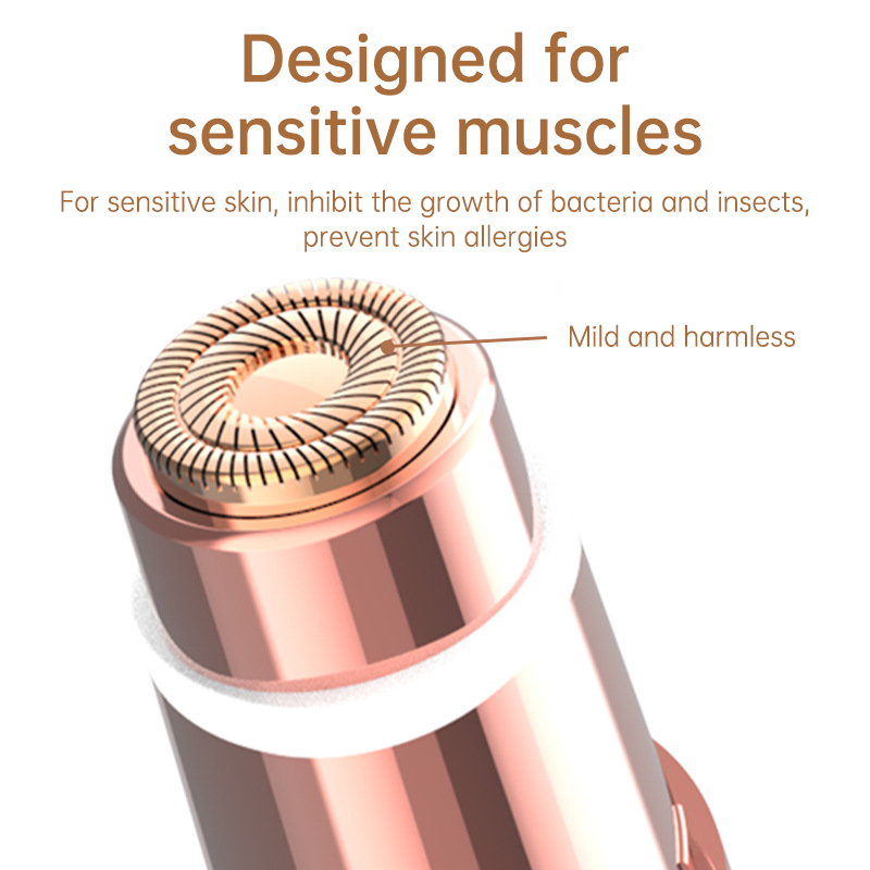 Close-up of rose gold electric hair remover head with a circular blade and text highlighting gentle design.