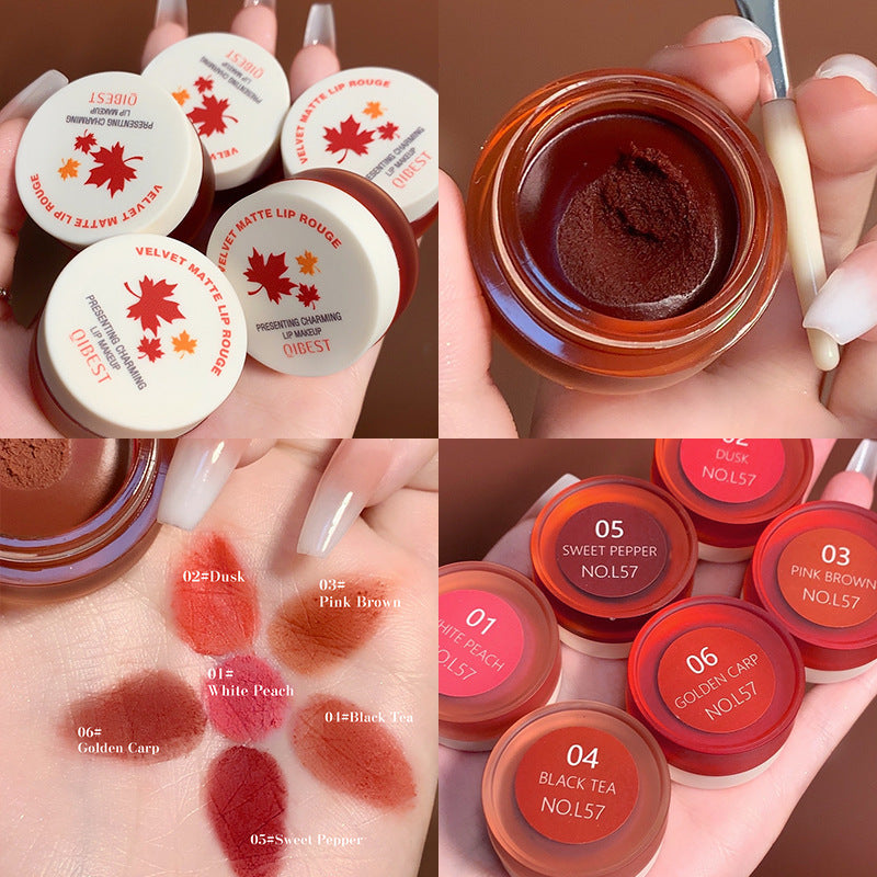 Four-panel view of Qibest Velvet Matte Lip Rouge jars in various red and brown shades with maple leaf lids and swatches.