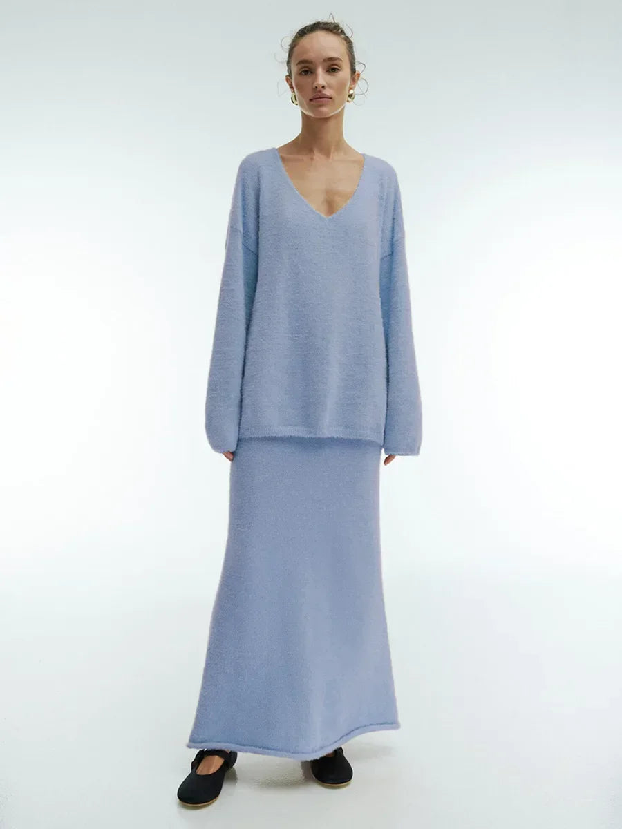 Women’s knitted V-neck sweater and skirt set by eprolo, featuring warm, thick, and casual autumn fashion with a cozy pullover and skirt.