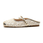 Pearl-embellished minimalist slide sandals by eprolo featuring sleek design and comfortable slip-on style.