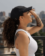 Black waterproof satin-lined dad hat from Plush Fashion Hub, showing a stylish, adjustable brim and sleek satin interior.