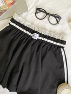 Lace trim elastic waist mini skirt in soft fabric with stylish design, perfect for casual or dressy occasions.