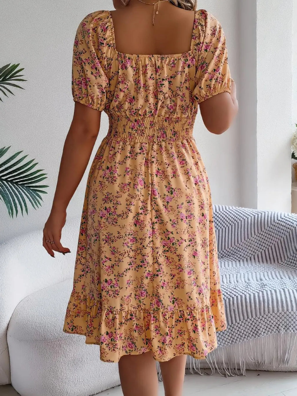 Shopimist floral puff sleeve dress with ruffled hem, featuring a feminine silhouette and colorful floral pattern.