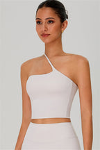 Fitglutes activewear two-piece set with one-shoulder crop top and matching shorts for gym and workout wear.
