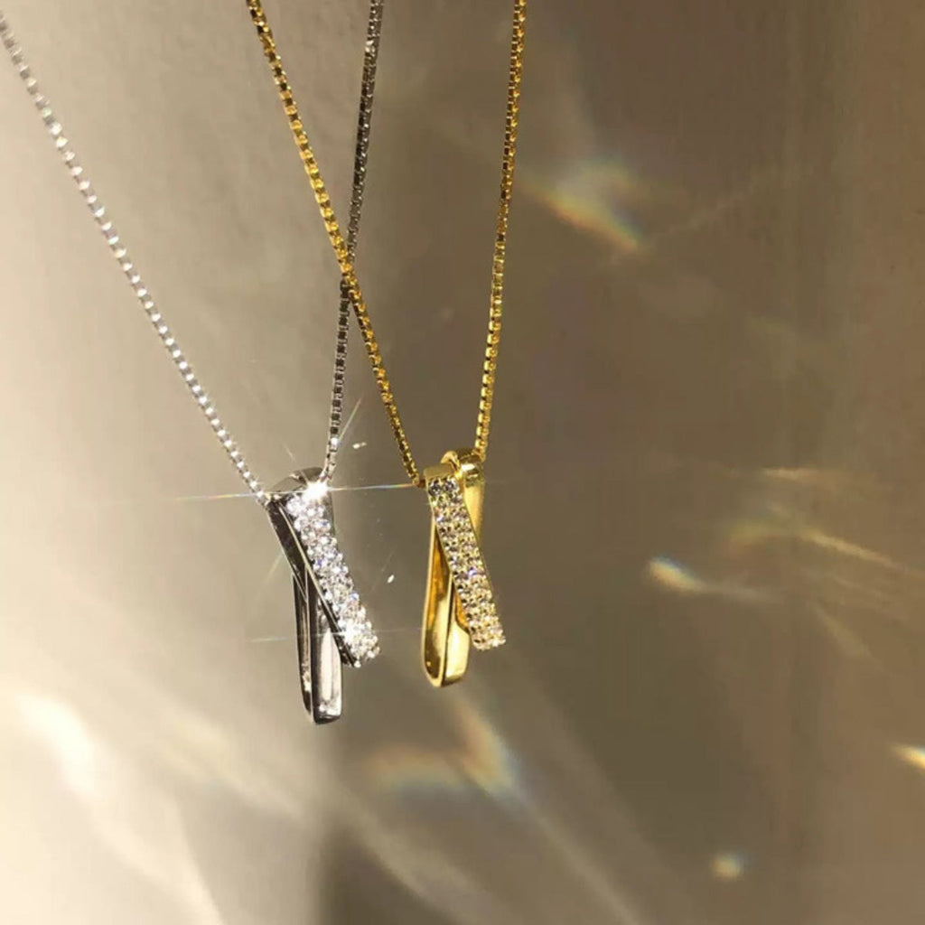Sterling silver zircon pendant necklace with intricate design, featuring sparkling zircon stones, by Shopimist.