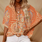 Plush Fashion Hub mandala print V-neck blouse, casual vacation top with vibrant design, short sleeves, and relaxed fit.
