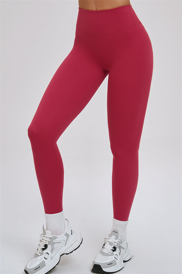 Fitglutes Activewear sports bra and leggings set featuring a kinetic cross-back design for workout and gym activities.