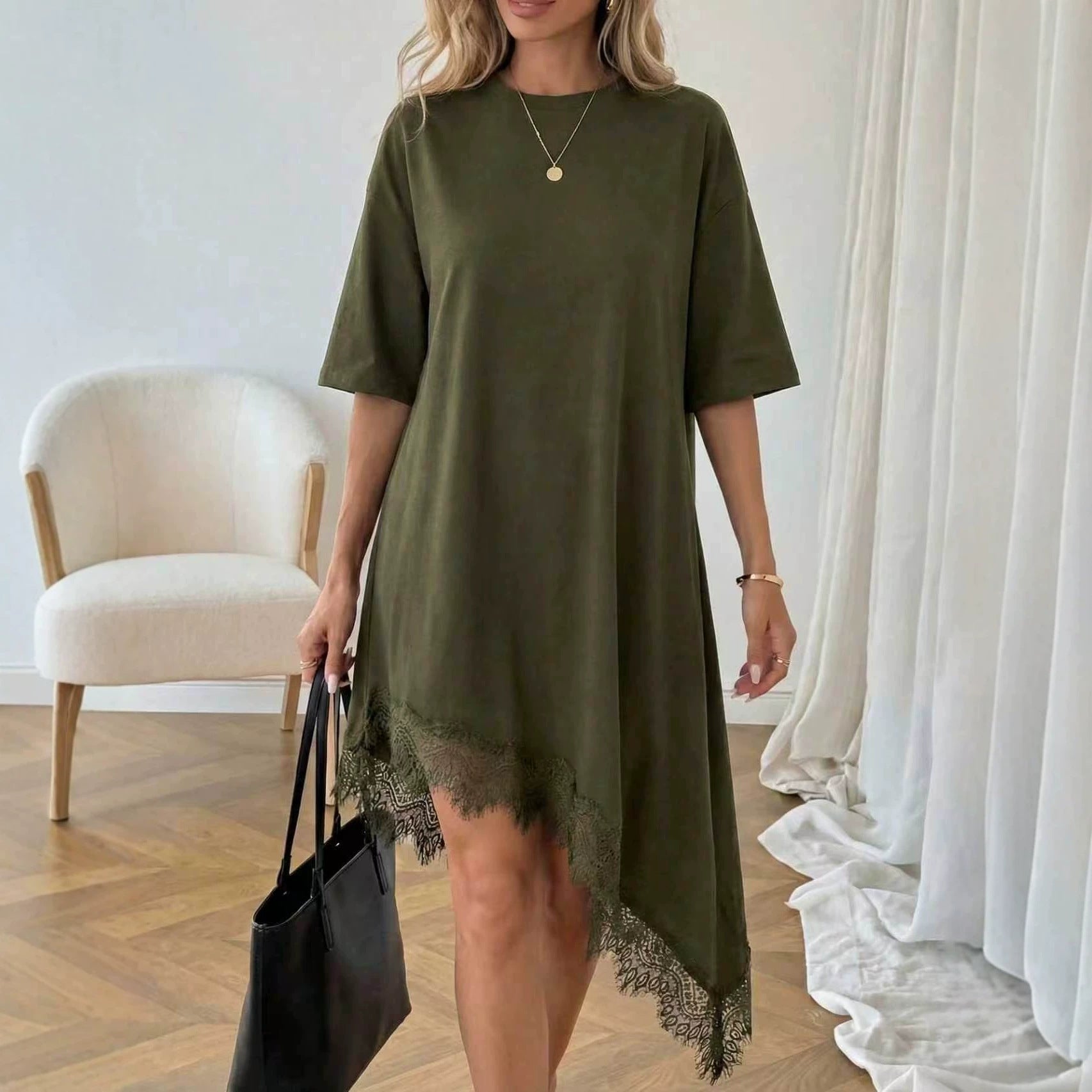 Women's lace trim asymmetric three-quarter sleeve dress from Plush Fashion Hub, showcasing elegant design and flowing fabric.
