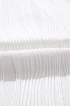Wavy textured Raina Tee by Threaded Pear, stylish casual top with a relaxed fit and unique fabric texture.