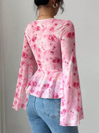 Floral print tie-front chiffon blouse with flare sleeves, stylish women's blouse by Trendsi, soft and lightweight fabric.