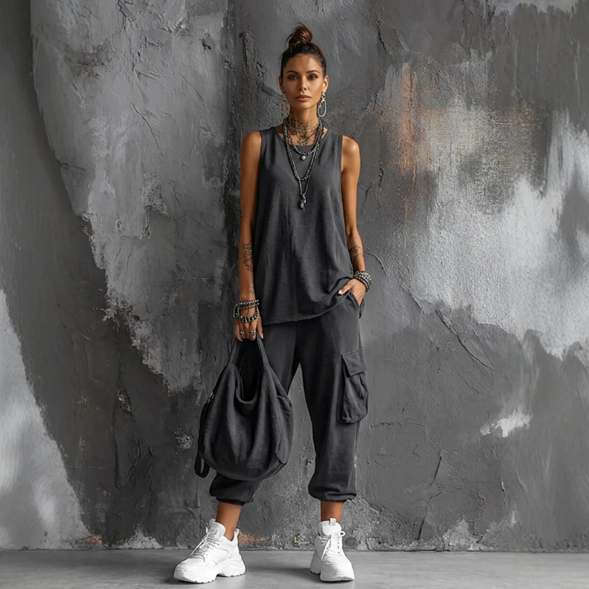Women's sleeveless tank top and cropped ankle pants set by Plush Fashion Hub, featuring a stylish two-piece outfit with a relaxed fit.