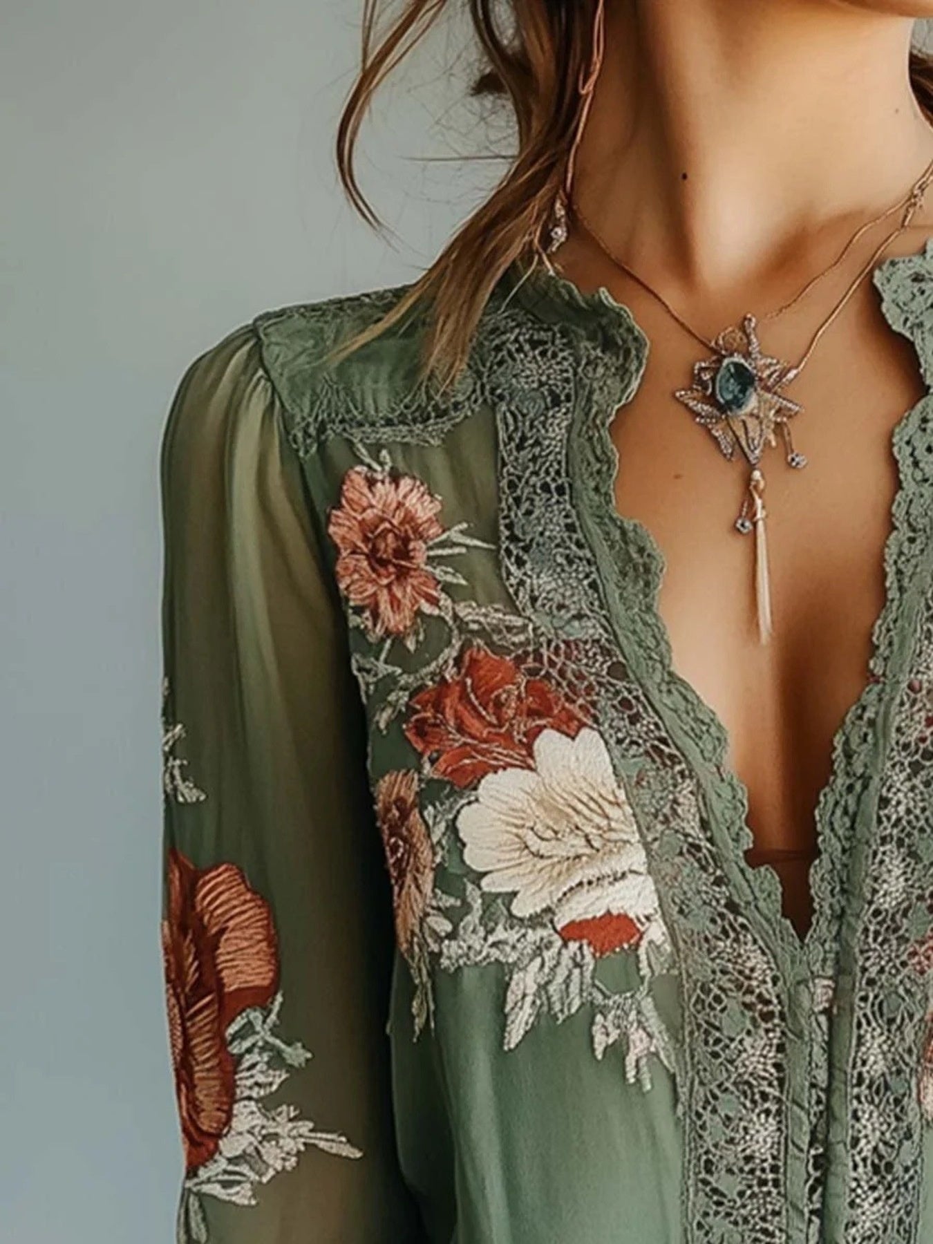 Elegant floral lace blouse by Plush Fashion Hub featuring long sleeves and sophisticated feminine design.