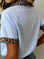 Women's leopard print short sleeve dress with contrast collar by Plush Fashion Hub, featuring a stylish, trendy design.