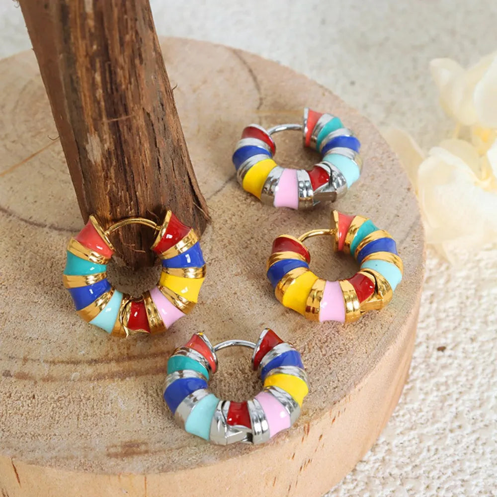 Titanium steel enamel hoop earrings with colorful design, fashionable jewelry accessory, by Plush Fashion Hub.