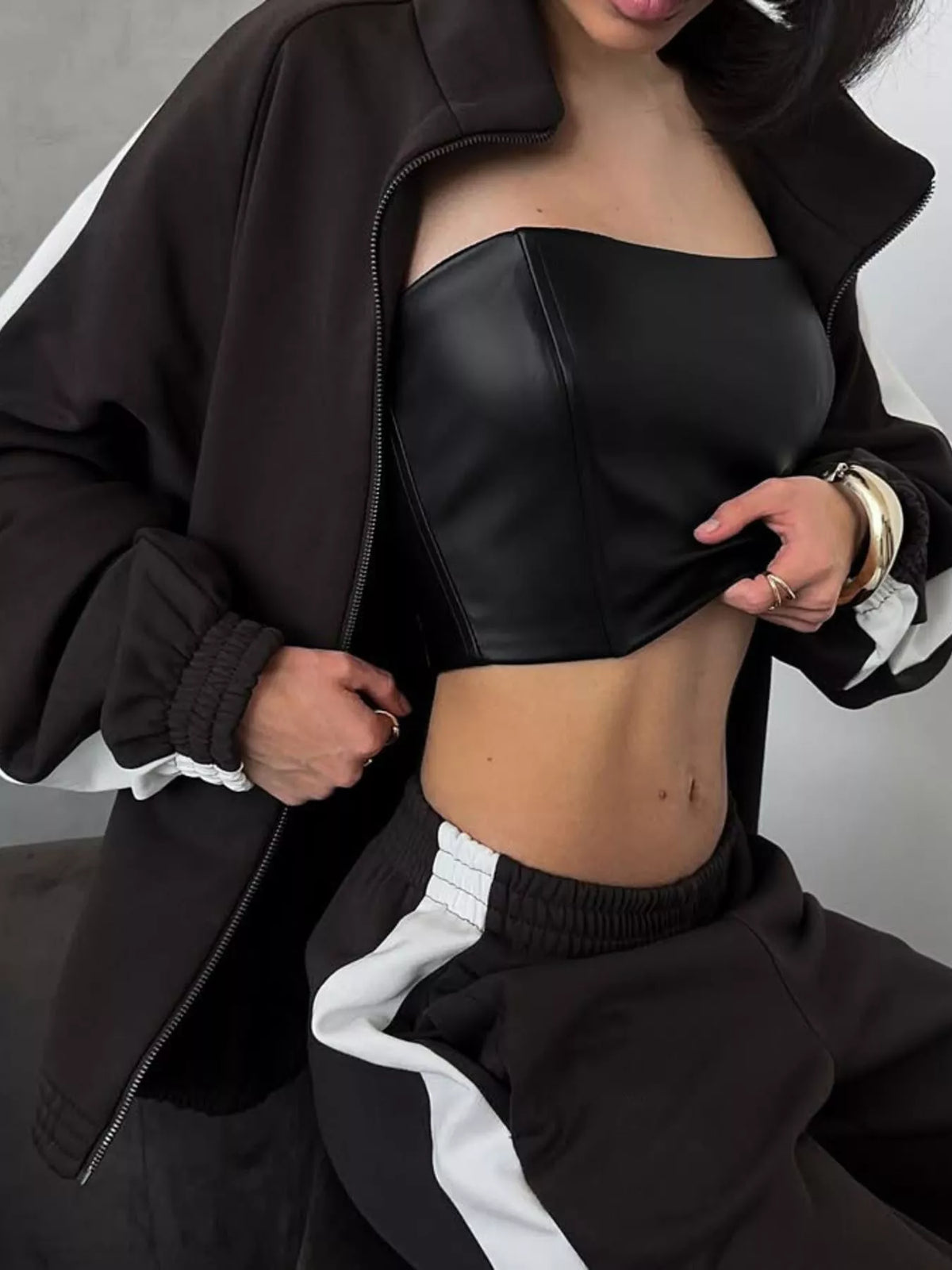 Plush Fashion Hub zip-up long sleeve tracksuit set, soft plush fabric, featuring a hooded jacket and matching pants in a stylish design.