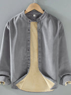 Men's plus size button-up long sleeve jacket by Shopimist, shown in black with front pockets and a classic collar.