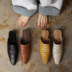 Handmade sheepskin ruched mule slides with square toe and low heel by FitiqueFit, featuring soft, textured sheepskin material.