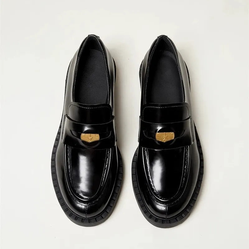 Women's round toe block heel loafers by Trendsi, stylish and comfortable shoes with a classic design and smooth finish.