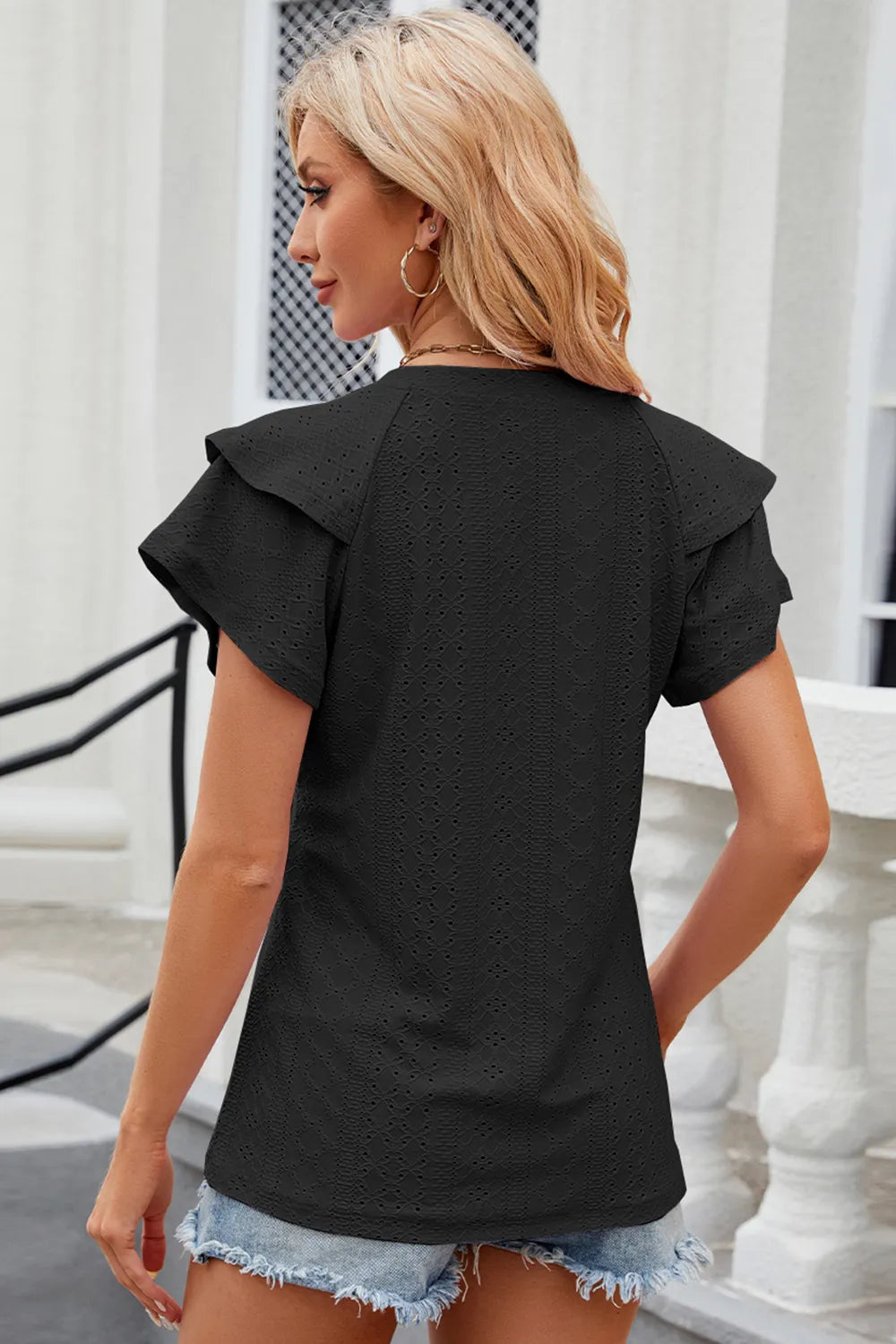 Trendsi eyelet notched flutter sleeve T-shirt featuring a relaxed fit, eyelet details, and flutter sleeves, shown in a stylish casual top.