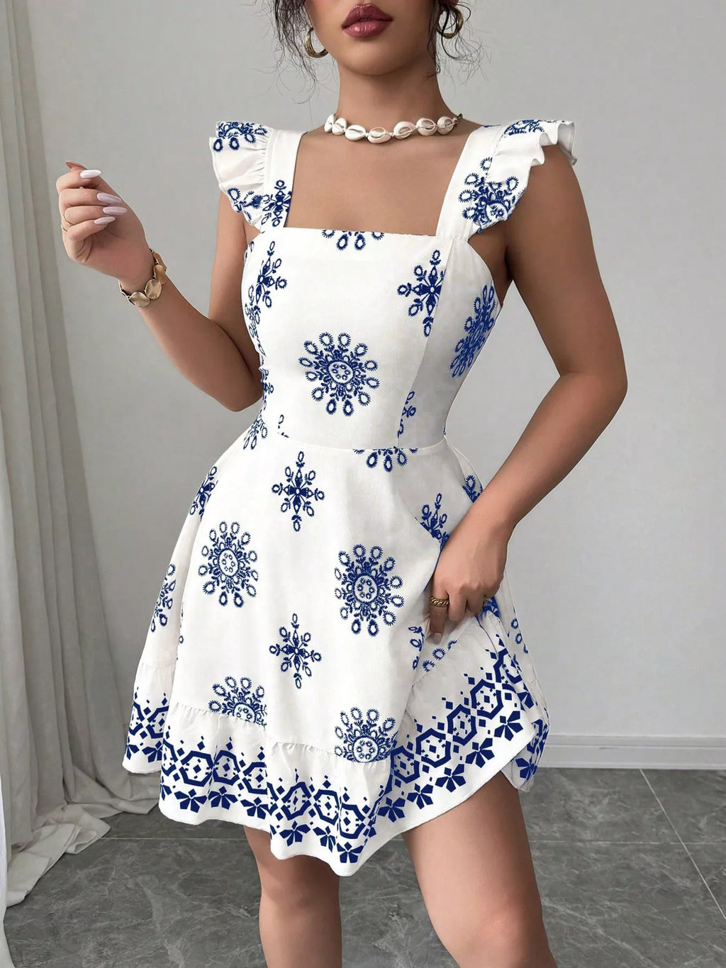 Printed Bow Back Square Neck Mini Dress by Shopimist featuring a square neckline, bow back detail, and a stylish mini length.