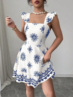 Printed Bow Back Square Neck Mini Dress by Shopimist featuring a square neckline, bow back detail, and a stylish mini length.