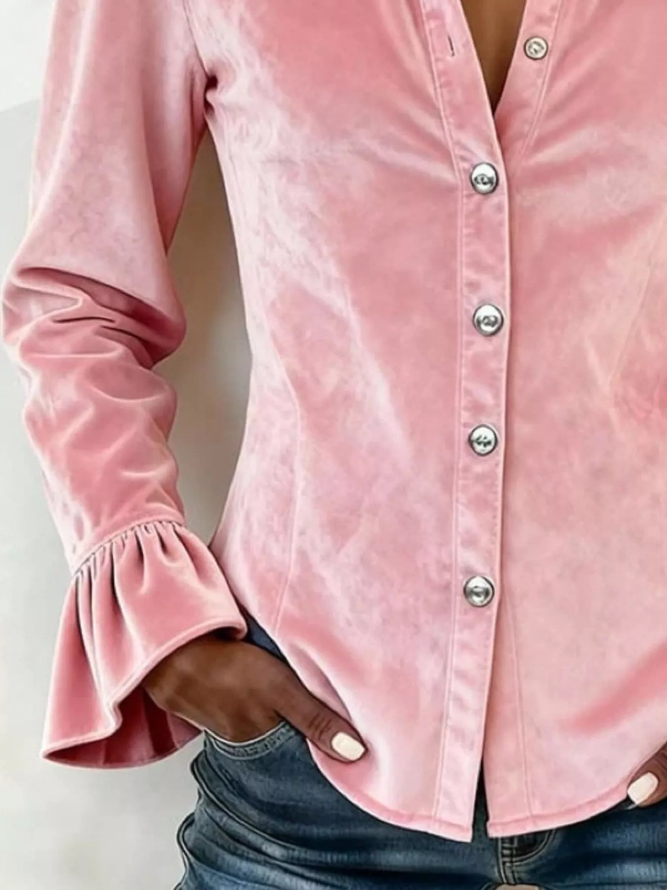 Plus size velvet button-up flare sleeve shirt from Trendsi, featuring a stylish full-length design and elegant long sleeves.